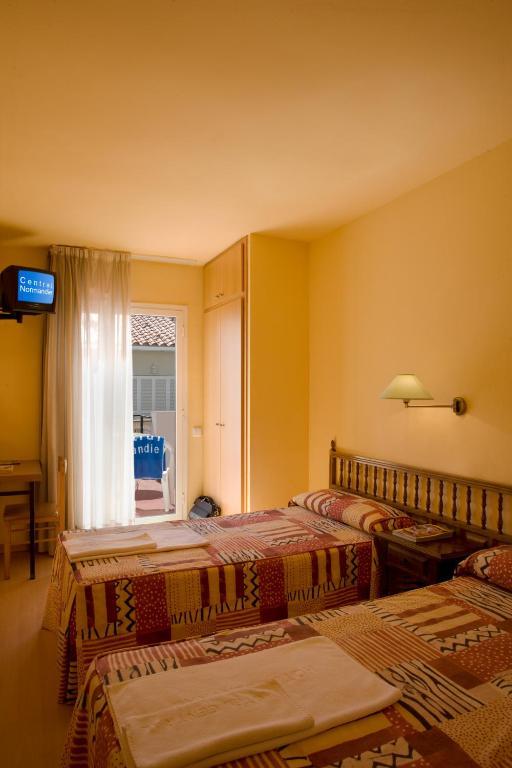 Hotel Central Normandie Sitges Zimmer foto